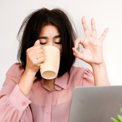 woman drinking coffee and everything is okay